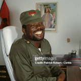 Prince Yormie Johnson, leader of the militant group Independent National Patriotic Front of Liberia (INPFL), sits in an office in Monrovia. Responding to years of government corruption and oppression, in 1989 the National Patriotic Front of Liberia (NPFL) launched a revolt against President Samuel Doe, seizing control of much of Liberia and plunging the country into massive civil war. During the war Prince Johnson split from the NPFL and formed the INPFL; then he and his forces captured, tortured, and executed President Doe. (Photo by Patrick ROBERT/Sygma via Getty Images)